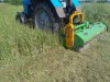 Покос травы трактором на дачных участках.